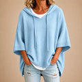 Poncho de Punto con Capucha en Azul Claro